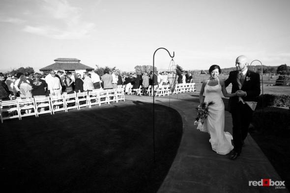 Moments after being married during an outdoor ceremony, Liz and Ted are pictured at Hidden Meadows in Snohomish, WA. (Photo by Dan DeLong/Red Box Pictures)