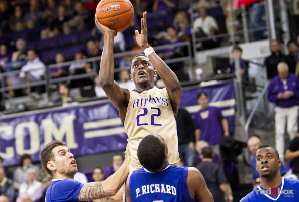 Washington Huskies' forward Justin Holiday shoot against the McNeese State Cowboys during the men's basketball season opener at UW's Hec Edmundson Pavilion. (Photo by Dan DeLong/Red Box Pictures)