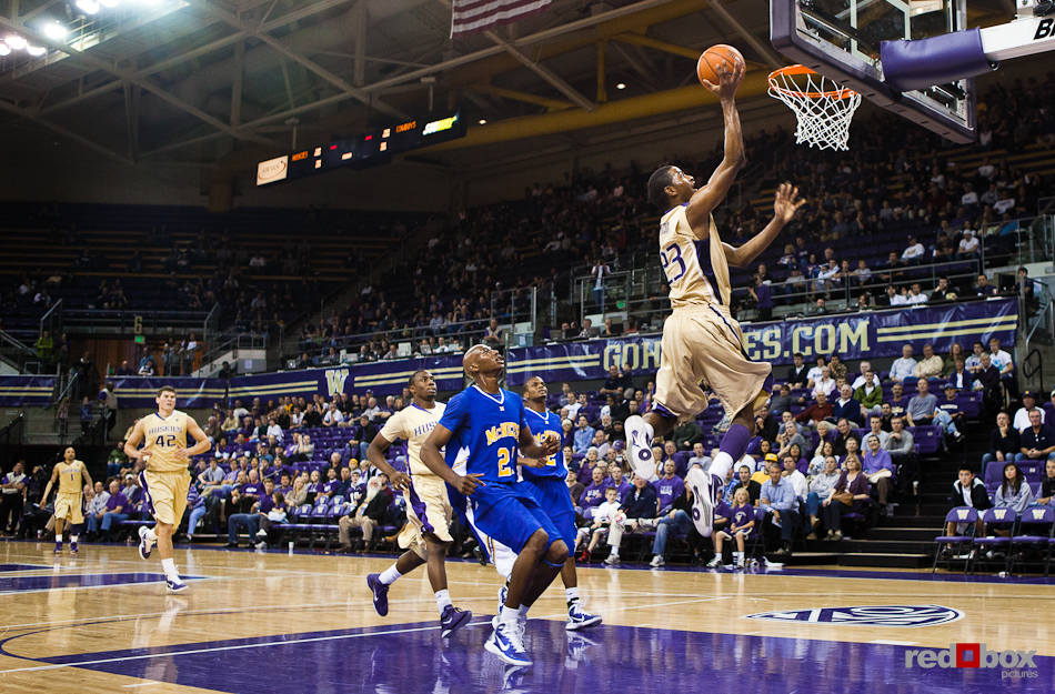 Washington Huskies' guard C.J. Wilcox scores a breakaway layup against the McNeese State Cowboys during the men's basketball season opener at UW's Hec Edmundson Pavilion. (Photo by Dan DeLong/Red Box Pictures)