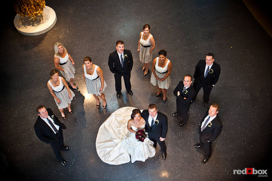 Nora and Neill pose with their wedding party inside the Bellevue Art Museum in Bellevue, WA. (Photo by Dan DeLong/Red Box Pictures)