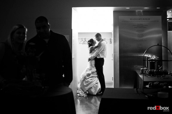 In the Bellevue Art Museum, Nora and Neill share a private moment during their wedding reception in Bellevue, WA. (Photo by Dan DeLong/Red Box Pictures)