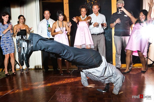 Angie and Jordan's guests dance during their wedding reception at the Edgewater Hotel in Seattle. (Photo by Dan DeLong/Red Box Pictures)