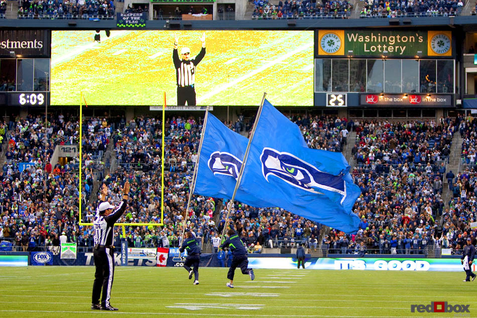 The Seahawks' flags come out as the Seahawks go ahead 24-14 in the third quarter of their 31-14 win over the Carolina Panthers.(Seattle Photography By Scott Eklund/Red Box Pictures)