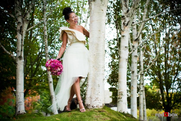 On her wedding day, bride Angie is photographed near Myrtle Edwards Park in Seattle. (Photo by Dan DeLong/Red Box Pictures)