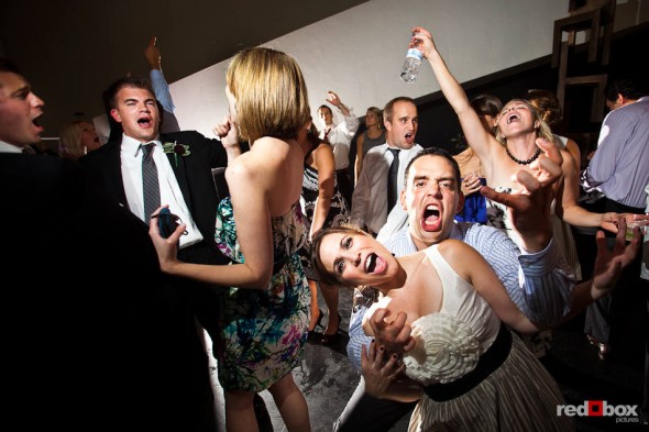 Nora and Neill's guests dance the night away during the couple's wedding reception at the Bellevue Art Museum. (Photo by Dan DeLong/Red Box Pictures)