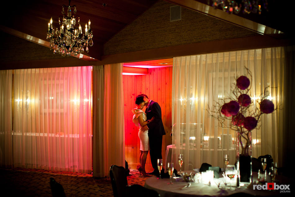 Angie and Jordan share a private moment during their wedding reception at the Edgewater Hotel in Seattle. (Photo by Dan DeLong/Red Box Pictures)