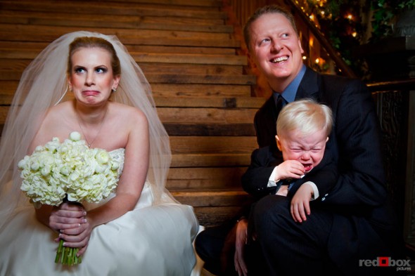 The ring bearer did not seem to want any part of the wedding or the bride prior to the start of the wedding ceremony at Lord Hill Farms in Snohomish, Washington. Wedding Photography By Scott Eklund Red Box Pictures Seattle