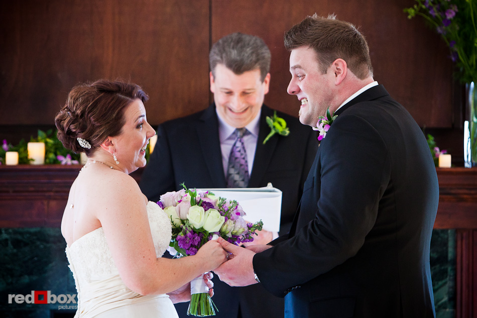 Kari and Matt show their happiness during their wedding ceremony at Courtyard Hall in Bothell. (Photo by Andy Rogers/Red Box Pictures)