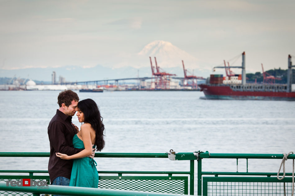 With Mount Rainier in the background, Sharisse and Craig enjoy the ferry ride from Seattle to Bainbridge Island during their engagement photo shoot. (Photos by Dan DeLong/Red Box Pictures)