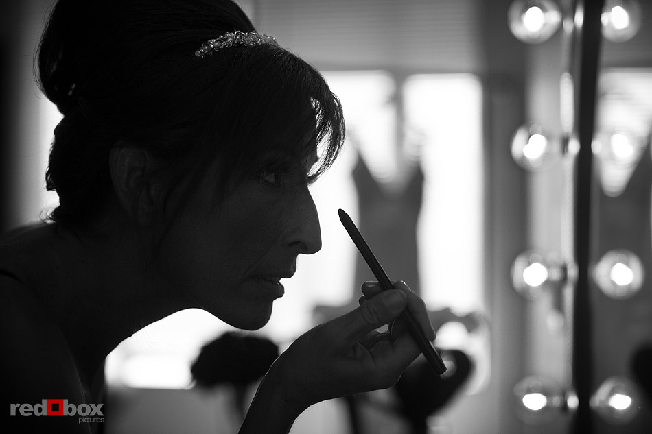 Summer puts the final touches on her makeup prior to her wedding ceremony at The Paramount Theater in Seattle. (Photo by Andy Rogers/Red Box Pictures)