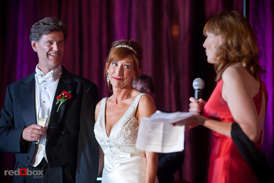 Summer and Jeff listen as her best friend, Molly gives a moving toast during their wedding reception at The Paramount Theater in Seattle. (Photo by Andy Rogers/Red Box Pictures)