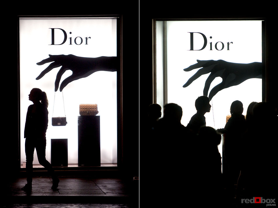 A Dior window display makes for an interesting backdrop near the Spanish Steps in Rome on a Friday night. (Italy photography by Scott Eklund/Red Box Pictures)