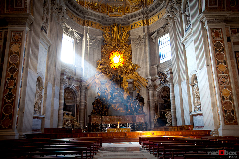 A beam of sunlight enters the sanctuary at Saint Peter's Basilica at the Vatican in Rome, Italy. (Italy photography by Scott Eklund/Red Box Pictures)