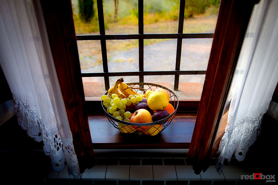 A basket of fruit on the windowsill at the villa in San Gimignano, Tuscany, Italy. (Italy Photography By Scott Eklund/Red Box Pictures)