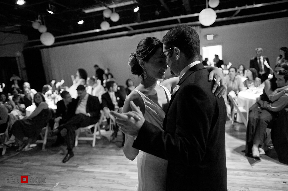 Jane and Kia share their first dance during thier wedding reception at Velocity Dance Center in Seattle. (Photo by Andy Rogers/Red Box Pictures)