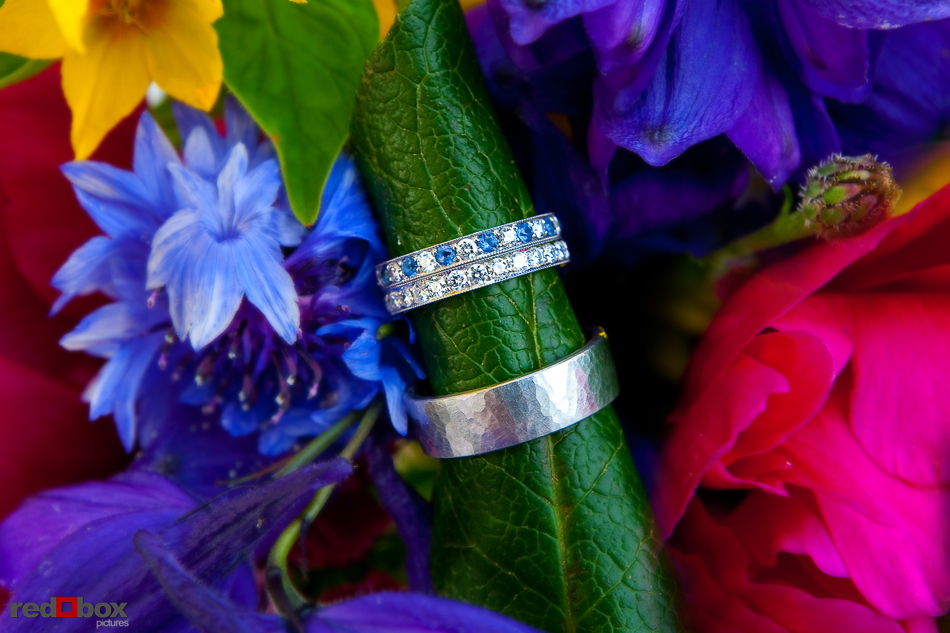 The wedding rings photographed with the bouquet at The Hall at Fauntleroy in West Seattle, WA. (Seattle Wedding Photographer Scott Eklund/Red Box Pictures)