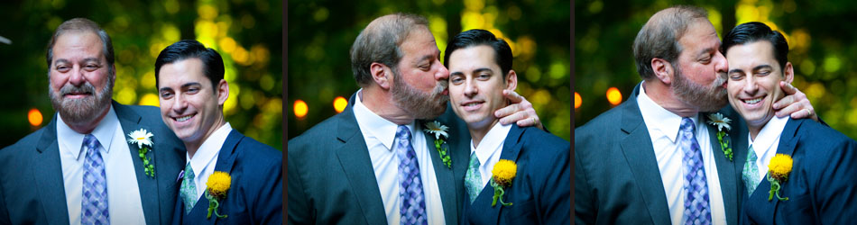 The groom gets a kiss on the cheek from his dad after the wedding ceremony at Treehouse Point in Issaquah, Wash. (Seattle Wedding Photographer Scott Eklund/Red Box Pictures)