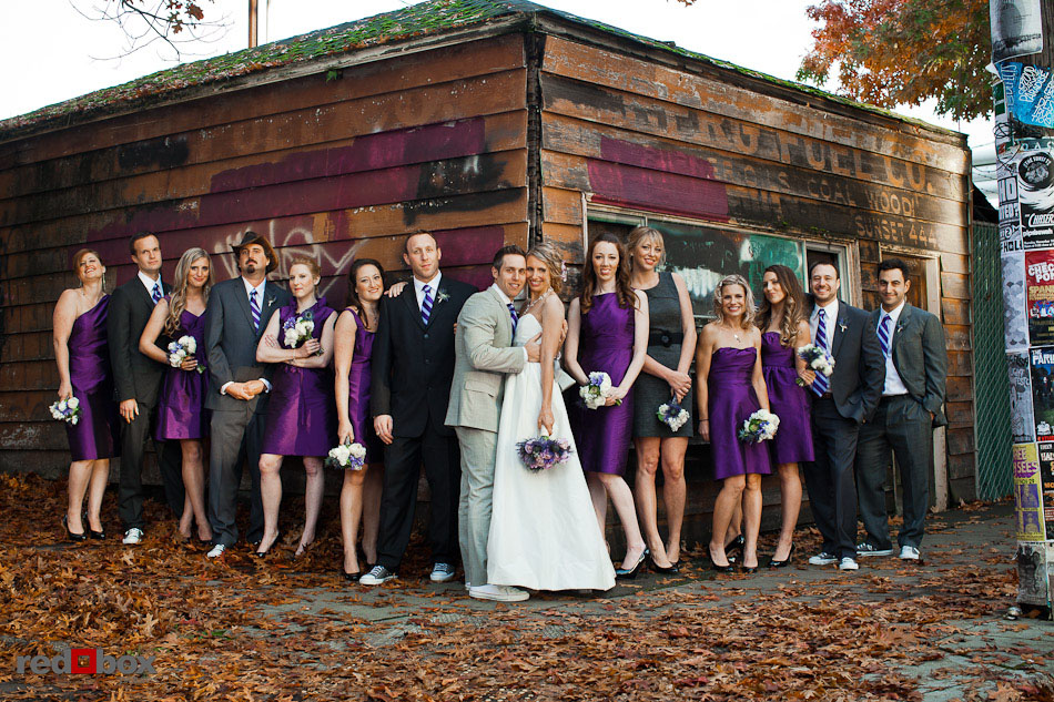 Amanda and Jed and their bridal party pose in old Ballard, Seattle on their wedding day.  (Photo by Dan DeLong/Red Box Pictures)