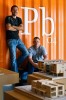 Chris Pardo, standing, and David Biddle, the principle architects at Pb Elemental in Seattle. (Photographer: Andy Rogers)