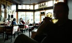 Sipping tea at B&O Espresso in Seattle's Capitol Hill neighorhood. (Photographer: Dan DeLong)