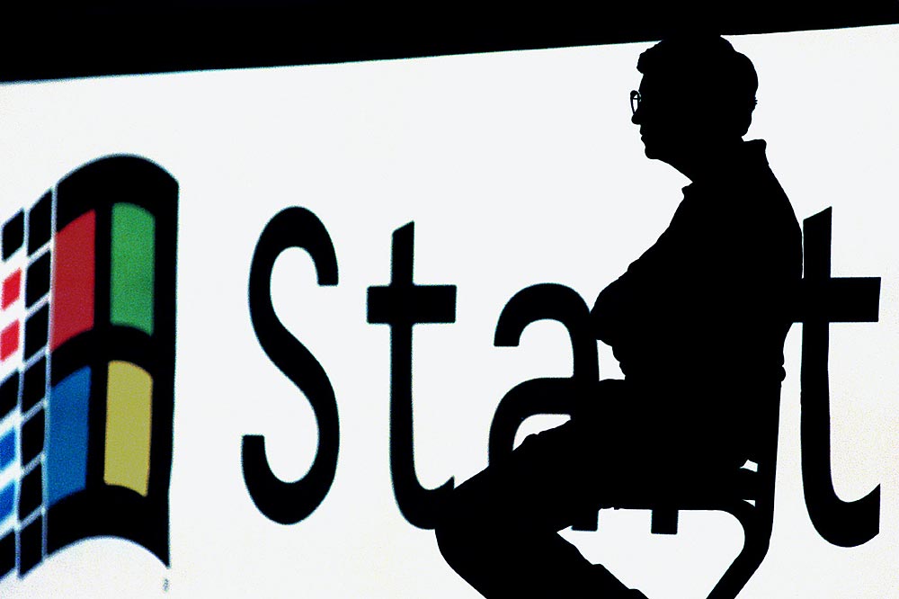 Bill Gates waits to speak at the launch of a new version of Microsoft Windows. (Photographer: Scott Eklund)