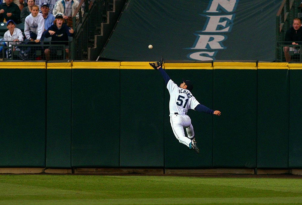 Ichiro Suzuki makes a leaping catch at Safeco Field. (Photographer: Scott Eklund)