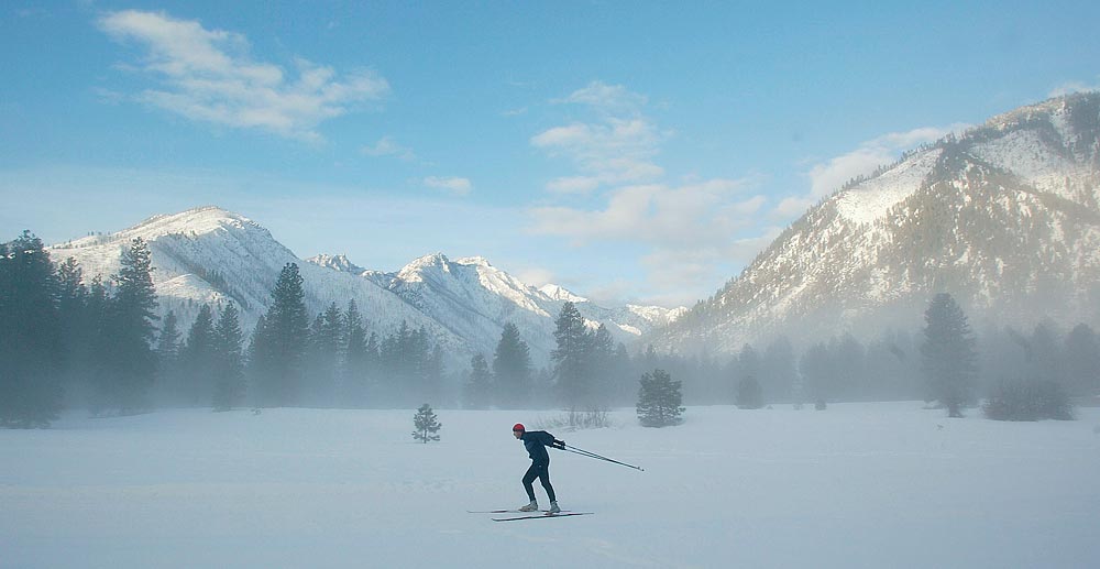 Rob Fallon cross-country skate skis across the Icicle River Trail in Leavenworth, Wash. (Photographer: Dan DeLong)