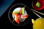 Rainbow roll of avocado, salmon and tuna with a Shanghai lemon drop at Genki Sushi in Seattle (Photographer: Scott Eklund)