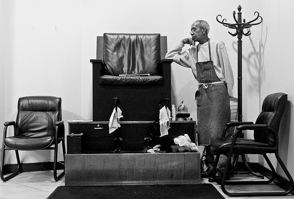 George Johnson retired from operating George's Shoe Shine in downtown Seattle after nearly 60 years of shining shoes. (Photographer: Dan DeLong)