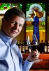 Ste. Michelle Wine Estates CEO Ted Baselerand in one of the chateau tasting bars. (Photographer: Andy Rogers).