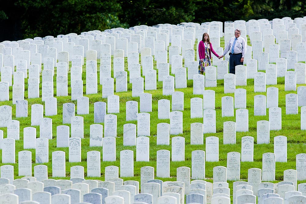 Paul Elvig stands with his wife, Ladonna among the gravestones there. The cemetery employees know love can bloom among the headstones and respectful silence. In fact the Elvigs met at an Everett cemetery years ago. (Photograph: Andy Rogers)