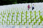 Paul Elvig stands with his wife, Ladonna among the gravestones there. The cemetery employees know love can bloom among the headstones and respectful silence. In fact the Elvigs met at an Everett cemetery years ago. (Photograph: Andy Rogers)