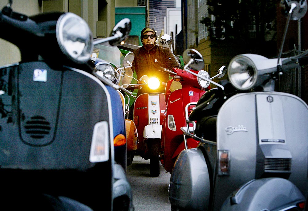 Aboard his 1979 Vespa P-series, Shawn Law attends the annual Festering OktoberScoot in Seattle. (Photographer: Dan DeLong)